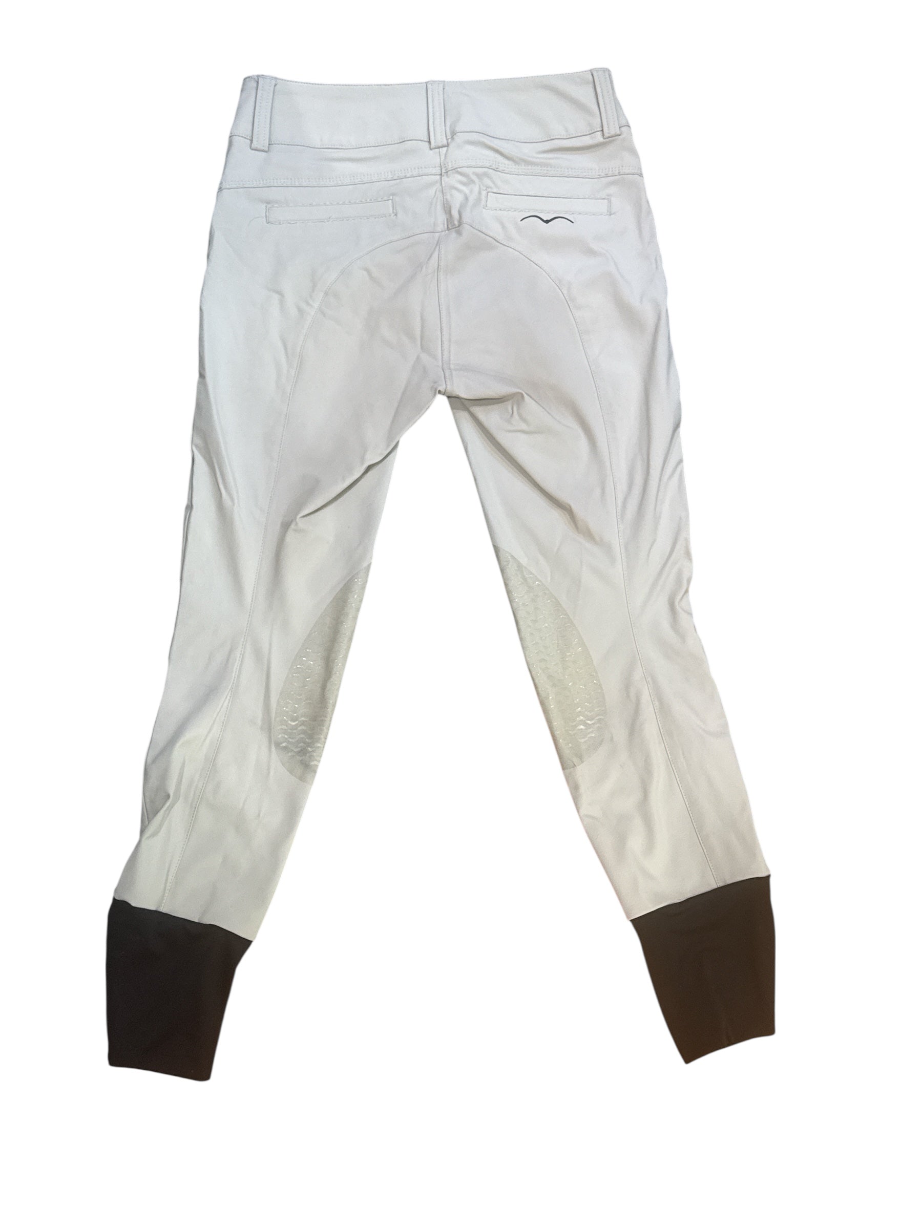 White riding pants with brown accents on a white background