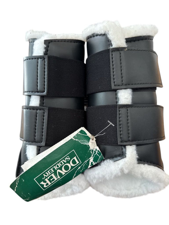 Pair of black horse boots with white fur lining and a Dover Saddlery tag on a white background.