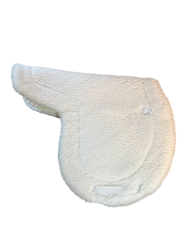 White fleece saddle pad on a white background