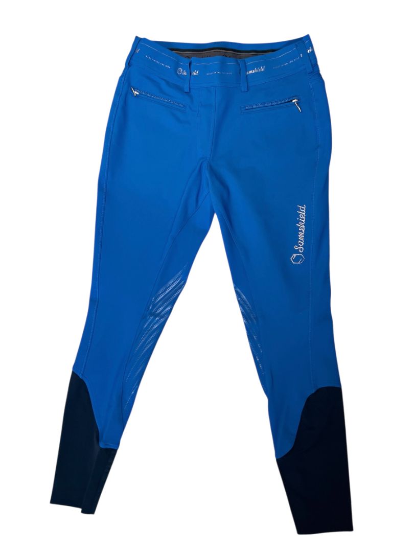 Blue riding pants with black accents on a white background