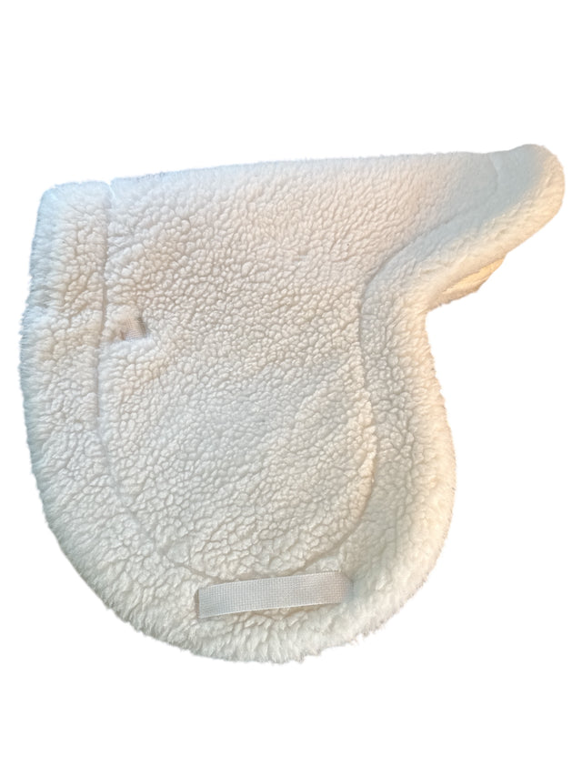 White fleece saddle pad on a white background