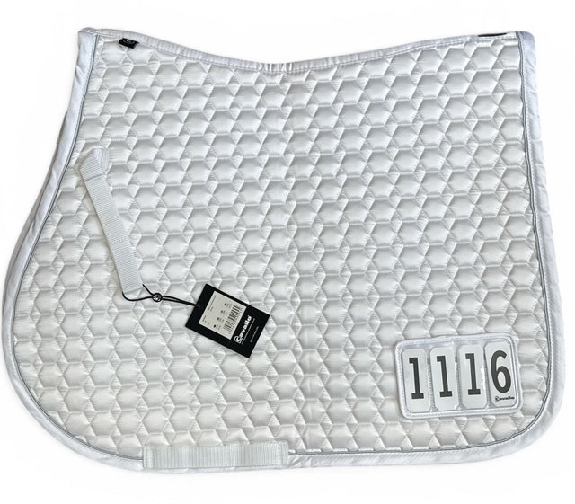 Equestrian saddle pad with diamond pattern and brand tag on a white background