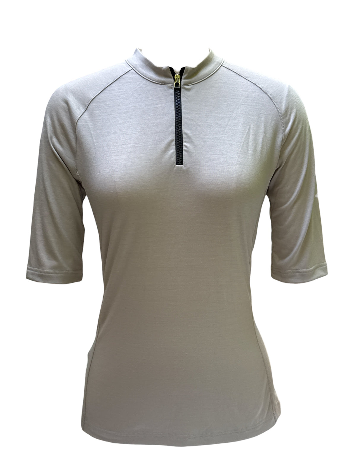 A women's short-sleeve athletic quarter-zip pullover in a light warm gray or sand color, featuring a mock neck and a black zipper with a gold pull tab.