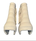 Pair of beige knee sleeves on a white background