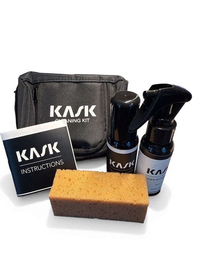 KASK cleaning kit with spray bottles, sponge, and instructions on a white background