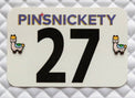 Card with 'PINSNICKETY' branding and number 27 on a textured gray background