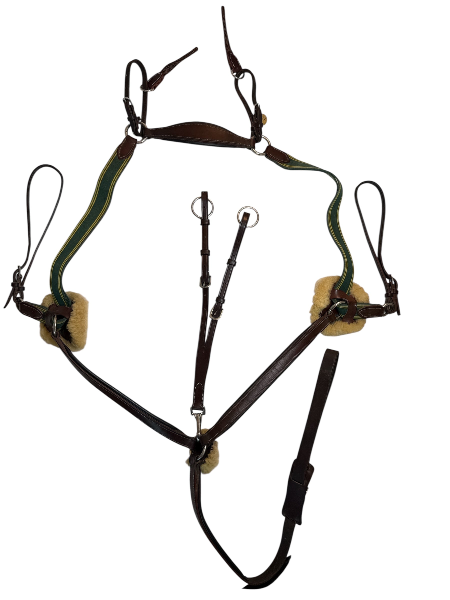 Horse tack with brown straps on a white background
